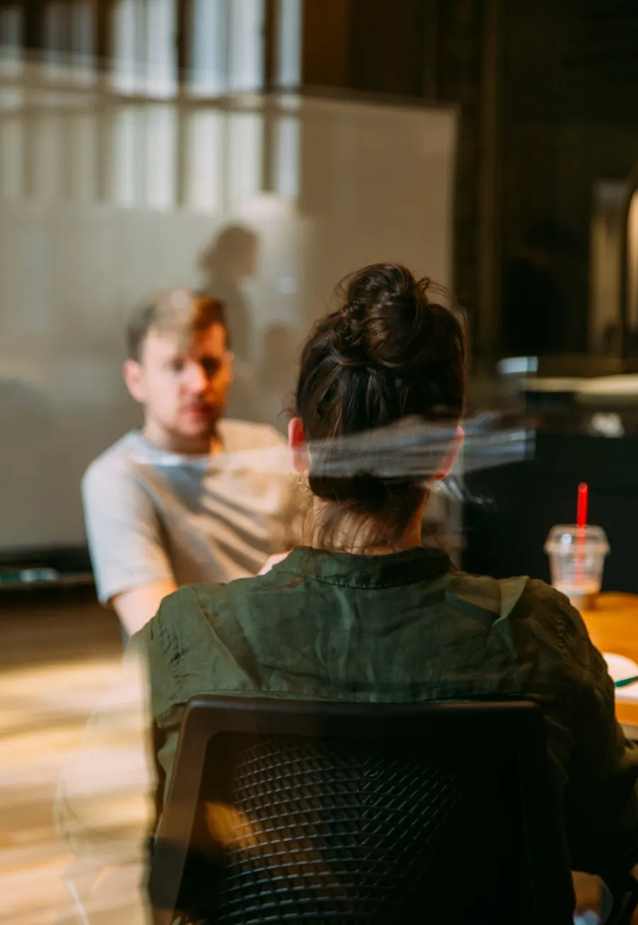Recruiter interviewing a candidate across a table